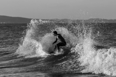 grayscale-photo-of-man-surfing-1554653_sw