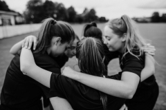 Rugby players huddle before a match