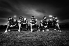 football-players-in-blue-jersey-lined-under-grey-white-186076_sw